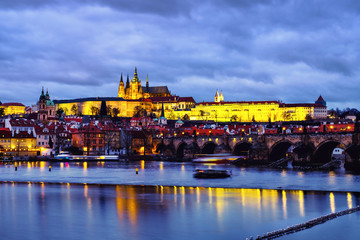 Charles Bridge over Vltava river in Prague, Czech Republic at night