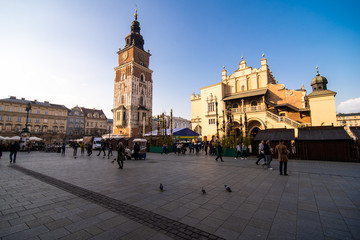 Naklejka premium Poland, Krakow - April, 2019: Main Market Square and St Mary Church.