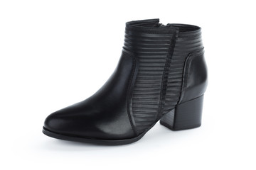 Female autumn-winter leather ankle  boots isolated on white background