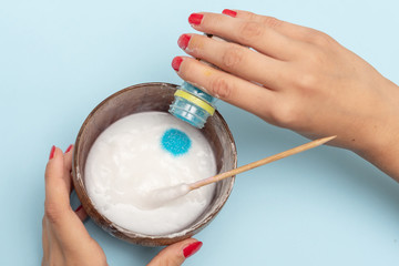 a girl making slime herself