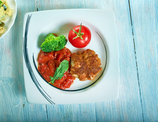 Fried cod with curry sauce and vegetables