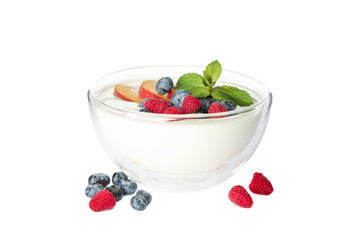 Bowl with sour cream yogurt and fruits isolated on white background