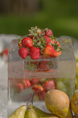 Fresh, clean natural and organic strawberries without preservatives and chemicals on ice