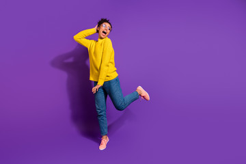 Fototapeta na wymiar Full length body size view portrait of nice attractive lovely cheerful cheery careless wavy-haired lady having fun free time isolated over bright vivid shine violet background