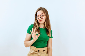 Sarcasm emotion. Young girl portrait against white background