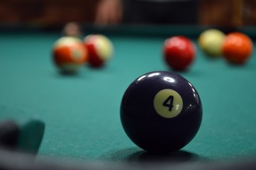 billiard game, in the foreground 4 purple ball