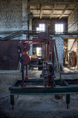 Obraz na płótnie Canvas The old industrial wood hangar with equipment