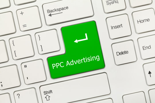 White conceptual keyboard - PPC Advertising (green key)
