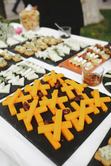 trays with various types of cheese