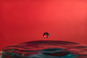 Water splash isolated on yellow background