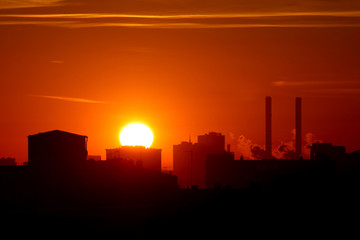 Fototapeta na wymiar silhouette of city at sunrise