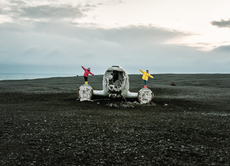 two girls on remains of the broken plane