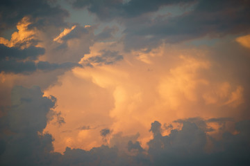 Cumulus clouds in the sunset sky.