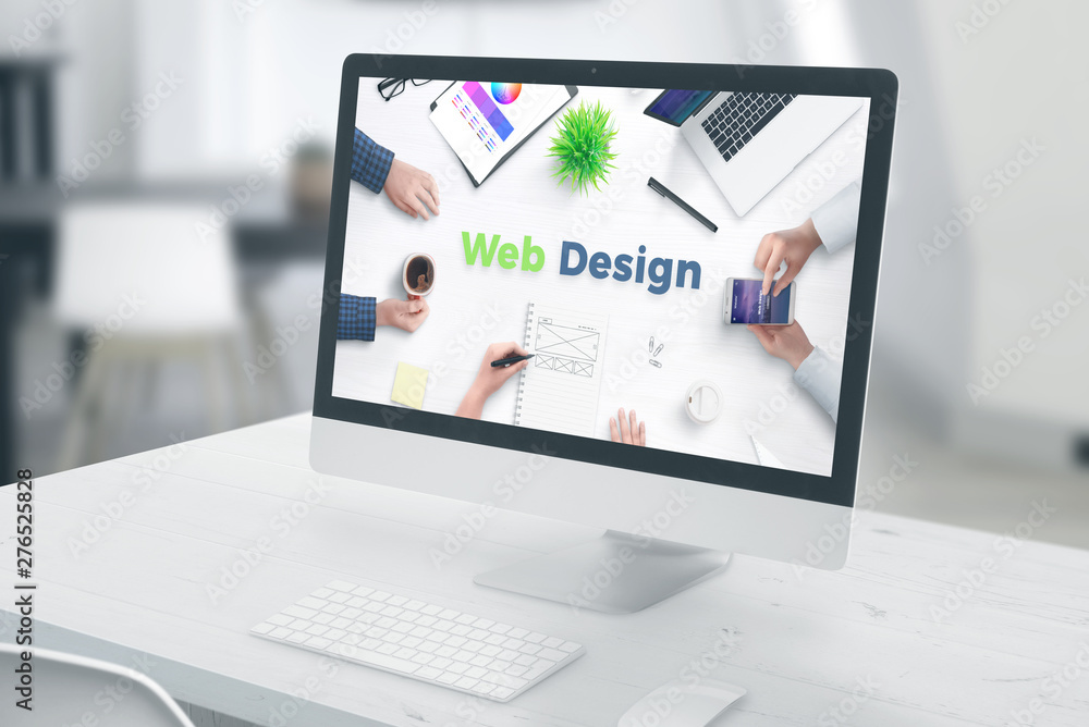 Leinwandbilder Computer display with web design text. concept of web design studio office.