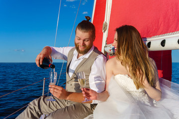 newlyweds traveling in a sailing boat