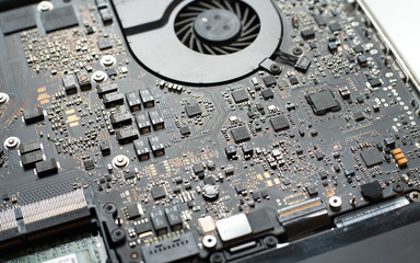 Electronic circuit board close up. Blurred background