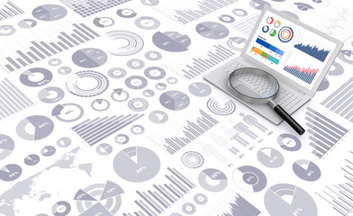 ノートパソコンと虫めがね:ビジネス資料背景