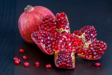 pomegranate on a wooden background - 276530457