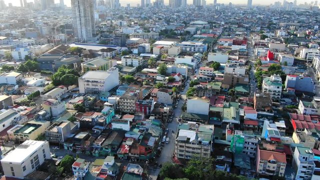 Forward view of the city,houses and buildings and some narrow road in metro manila Philippines.