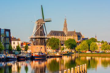 Fototapeta na wymiar Skyline of Haarlem, North Holland, Netherlands, with Windmill 