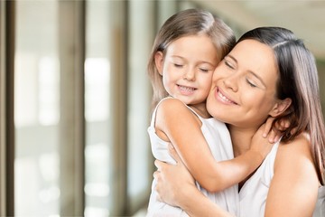 Happy Mother and daughter hugging