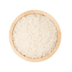 White rice in wooden bowl isolated on white background top view raw food object design