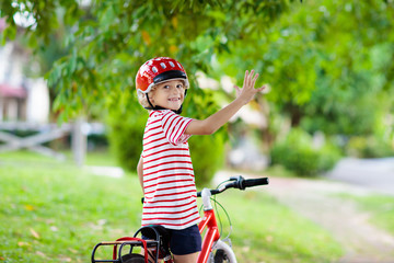 Naklejka premium Kids on bike. Child on bicycle. Kid cycling.
