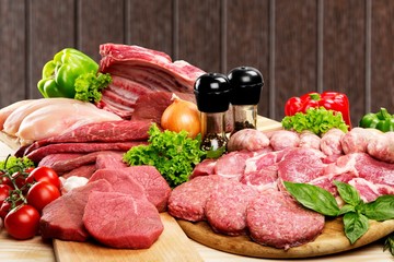 Fresh Raw Meat Background with vegetables