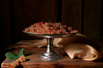 Pink berries in a vase