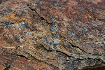Fotografías de texturas de piedras con tonos rojos y gris para fondos. 