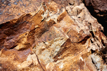 Fotografías de texturas de piedras con tonos rojos y gris para fondos. 