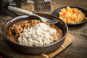 Barley groats with stewed meat.
