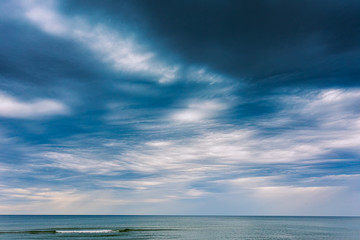 Fototapeta na wymiar Asperitas clouds over the Baltic sea, Lithuania