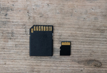 flash memory SD and micro SD cards on a wooden board