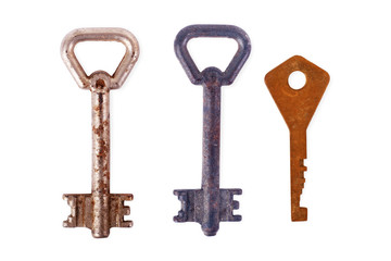 Old rusty door key isolated on white. three key set