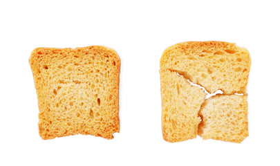 Toasted bread (Italian bruschetta toasts) isolated on white background. Slices of toasted baguette set