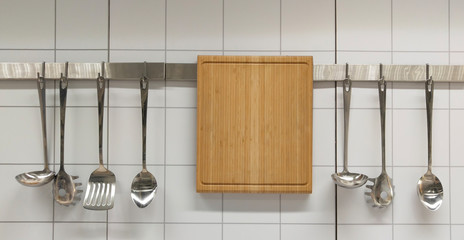 Chopping board, cooking spoon, ladle, curry scoop.