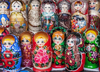 Matryoshka is a national Russian souvenir. Russian wooden doll matryoshka on the counter of the...