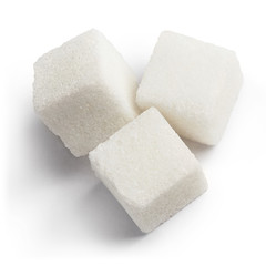 Three white sugar cubes, view from above, isolated on white background