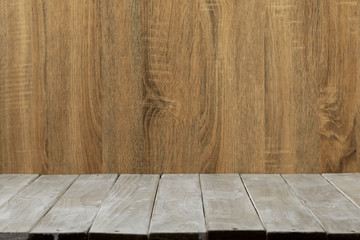 Empty top wooden table and wood wall