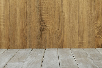 Empty top wooden table and wood wall