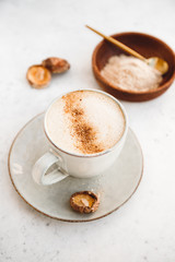 Mushroom latte with shiitake powder and unsweetened coconut-almond blend milk. Healthy useful vegan drink.