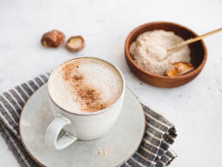 Mushroom latte with shiitake powder and unsweetened coconut-almond blend milk. Healthy useful vegan drink.