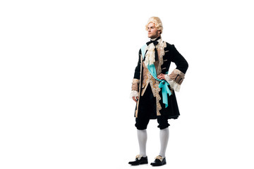 victorian man in wig standing with hand on hip isolated on white