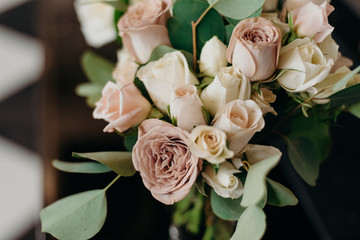 Wedding flowers closeup. Decoration made of roses and decorative plants