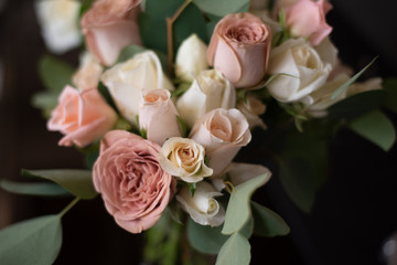 Wedding flowers closeup. Decoration made of roses and decorative plants