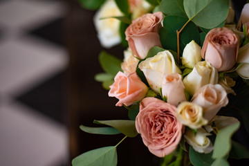 Wedding flowers closeup. Decoration made of roses and decorative plants