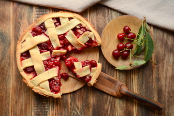 Delicious homemade cherry pie on wooden background Summer and autumn baked Top view