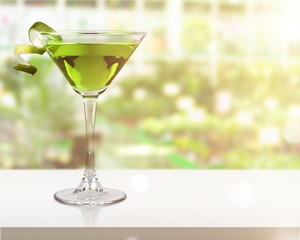 Glass of alcohol  cocktail on background