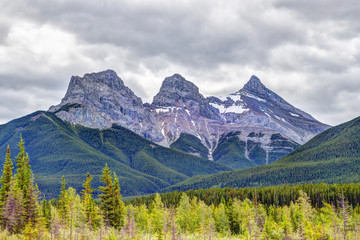 Three Sisters Mountain Peaks in the Canadian Rockies of Canmore, Alberta, Canada